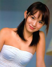 Hot gravure idol is saucey and steamy in her short silver skirt