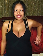 Busty Thai slut with a beautiful smile and huge boobs sucks and tit fucks